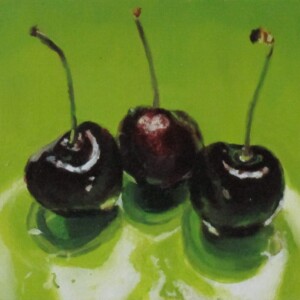 Cherries in a green bowl